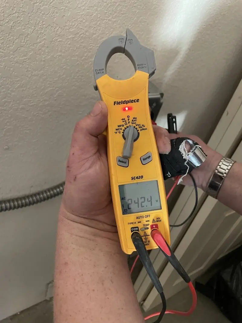 Voltage testing with clamp meter during Electrical Installation Services in Bainbridge Island